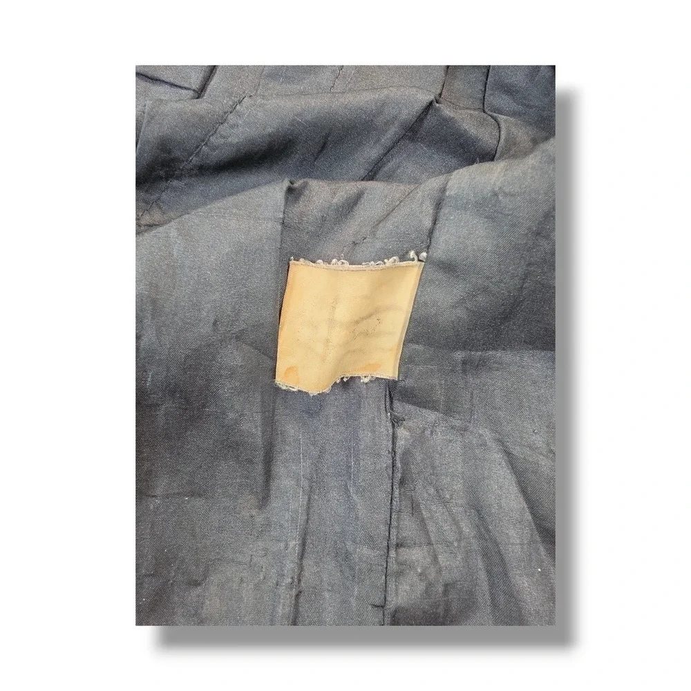 Unknown fadded tag this vintage